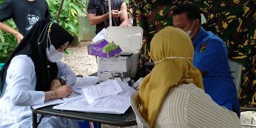 Terkuak Dibalik Suksesnya Vaksinasi Kampar dan HP Jadul Warga