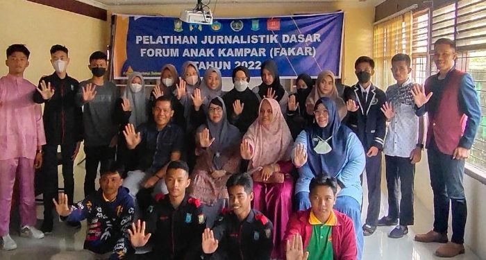 Ketua PWI Kampar Paparkan Cara Penulisan Berita Ramah Anak