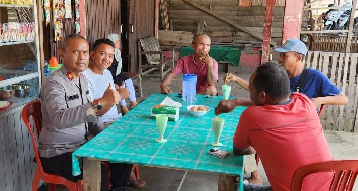 Kapolsek Kampar Kiri Sampaikan Program pada Jumat Curhat