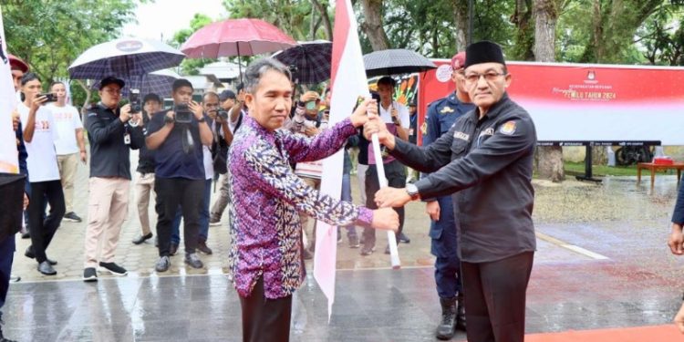 Kirab Pemilu 2024 Di Kampar Dibawah Guyuran Hujan