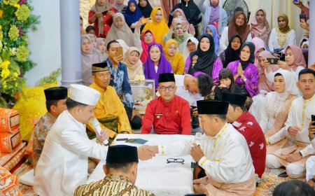 Pj. Bupati Kampar M. Firdaus Jadi Saksi Nikah Putra Datuk Bandaro Mudo Yusri