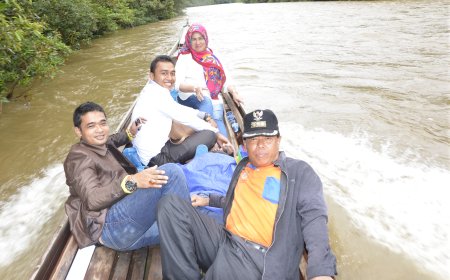 Eva Yuliana Arungi Sungai Subayang