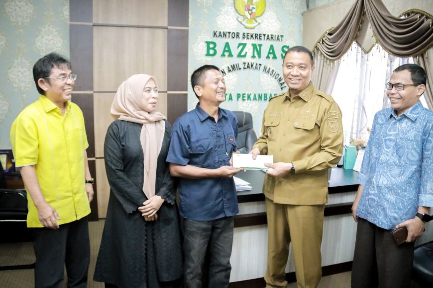 Korban Kebakaran di Kapau Sari Terima Bantuan Wawako Pekanbaru